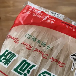 Rice noodles with a bug inside