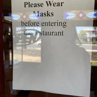 a sign on the door of a restaurant