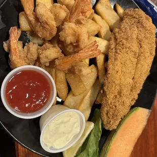 Fried catfish and shrimp with steak fries