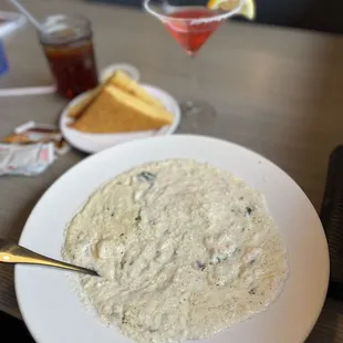 a bowl of soup with a spoon in it