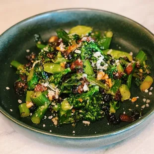 Sauteed Broccolini: guanciale, almond, currants, parmesan, at Pacific Standard Prime steakhouse in Redondo Beach