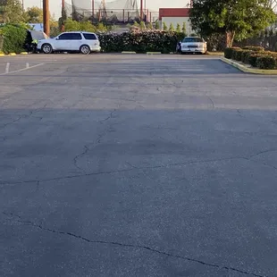 two cars parked in a parking lot