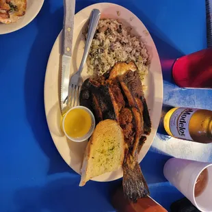 Crab Stuffed Flounder with  roce pilaf and garlic bread