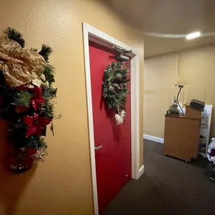 12.08.24 Holiday decor all about! Even on the way to the restrooms.