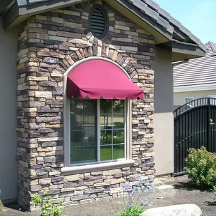 Custom Arched Top Traditional Style Sunbrella Fabric Awning