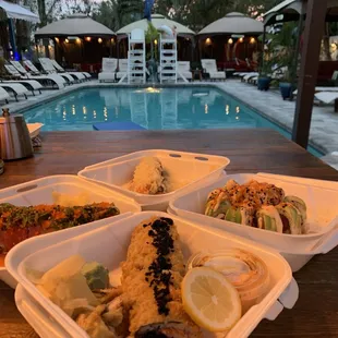 Sushi to go, enjoyed by the pool