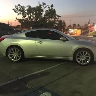 20 staggered lexani wheels silver center with chrome lip wheels