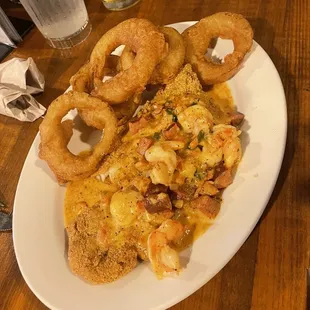 Catfish with creole sauce and onion rings