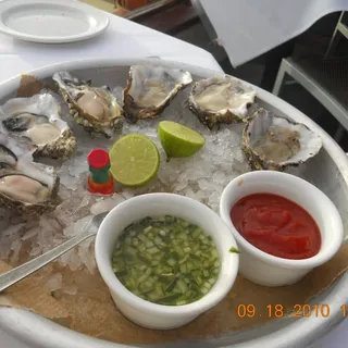 OYSTERS ON THE HALF SHELL