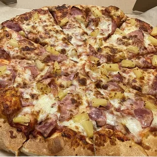 Large Hawaiian pizza i've could of sworn there was more toppings than this last time but hey at least it taste good.