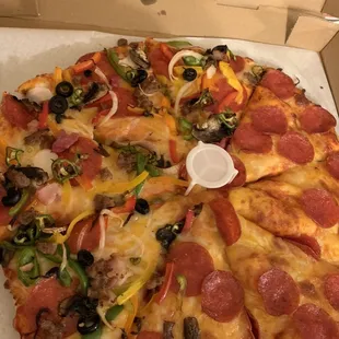 pepperoni, olives, peppers, and cheese