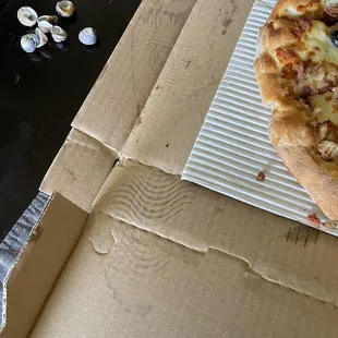 Big shoe print on the inside of our pizza box