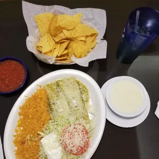 2 Chicken Verde Enchiladas w/a  white cheese sauce .... Amazing DEEEEELICOUS