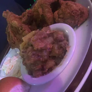 Delicious broasted chicken. The side is German potato salad, kind of different from the norm.