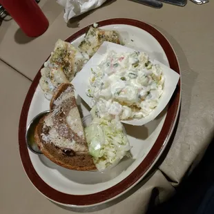 Baked haddock, crab salad side