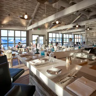 a restaurant with a view of the ocean