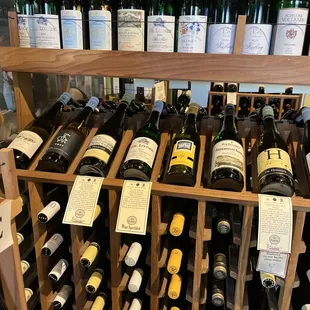 a wine rack full of wine bottles