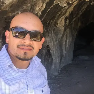 At the entrance to the cave