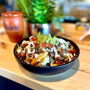 a bowl of mexican food