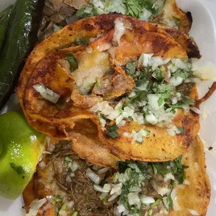 Birria tacos and I added grilled serranos.