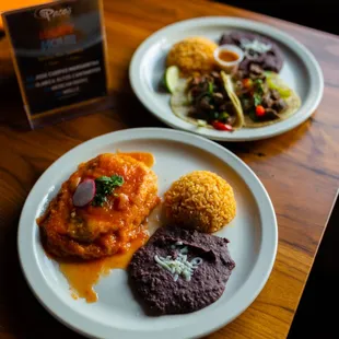 chile relleno plate with rice and beans and the taco special