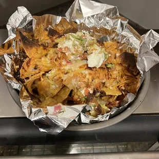 Nachos after more cheese and melting the pre existing.