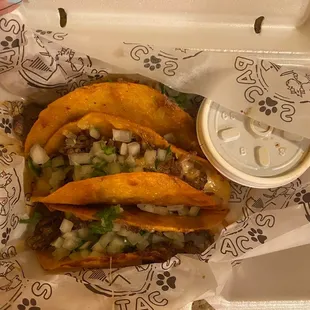 Birria tacos with consume
