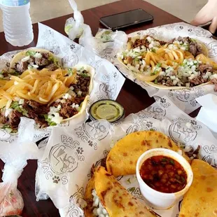 a variety of tacoss on a table