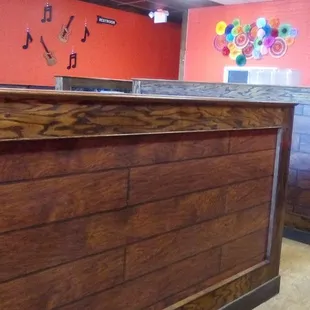 Inside Paco's Tacos. Dividers segregate you from other diners.