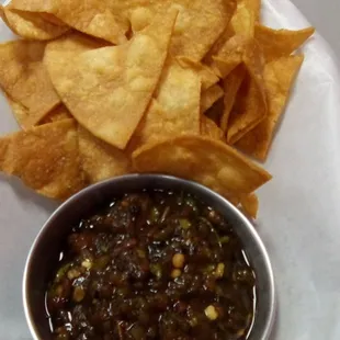 Paco's Tacos: the chips are hard and lack flavor. The chimichurri like salsa is grainy and has no flavor.