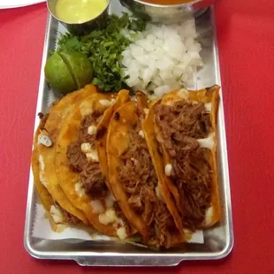 Birria Tacos at Paco's Tacos. The little sauces were not good, the consomme was very good, and the tacos excellent.