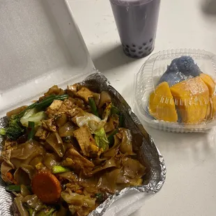 22 - Pad See Ew w/ Tofu and veggies, Taro milk tea w/ boba, and 52 - Mango with Sticky Rice (Seasonal)