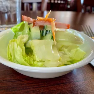 a salad in a white bowl