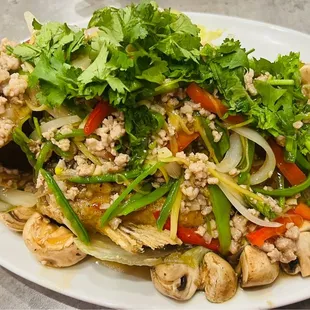 a plate of stir fried vegetables