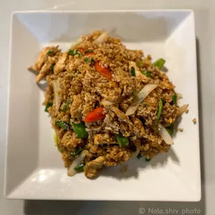 a plate of food with meat and vegetables