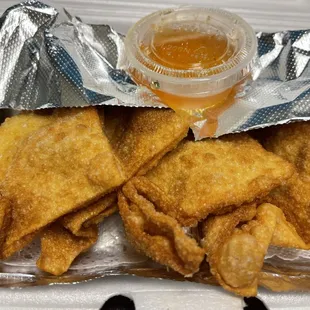 fried food in a styrofoam container