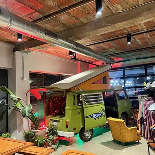 a vw bus parked in a garage