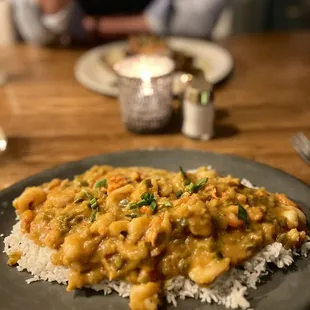 Crawfish etouffee on top of basmati rice
