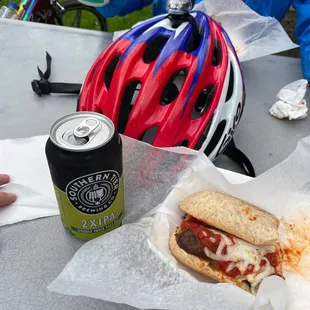 a bicycle helmet and a hot dog