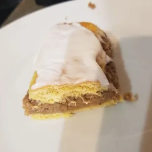 Half a bear claw stuffed with nuts.