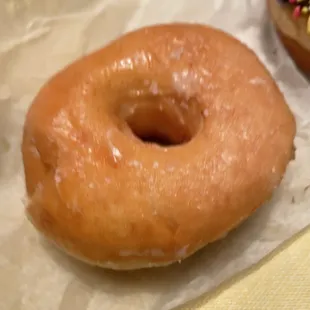 a glazed donut with sprinkles