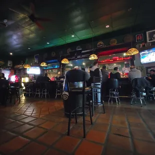 people sitting at the bar