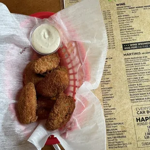 a basket of fried chicken nuggies