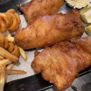 The fish comes with fries. You can upgrade to curly fries for a small fee.