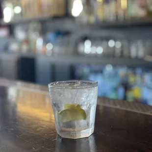 a shot of a glass of gin
