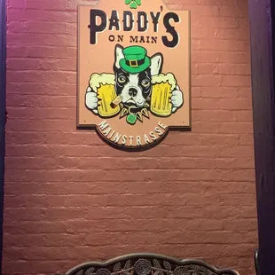 a sign for paddy&apos;s on main