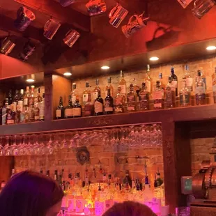 a woman sitting at a bar