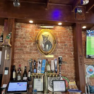 a bar with a brick wall