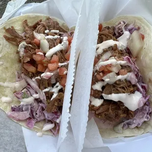 a pulled pork taco and cabbage slaw