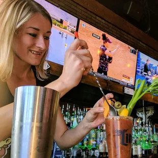 a bartender preparing a drink